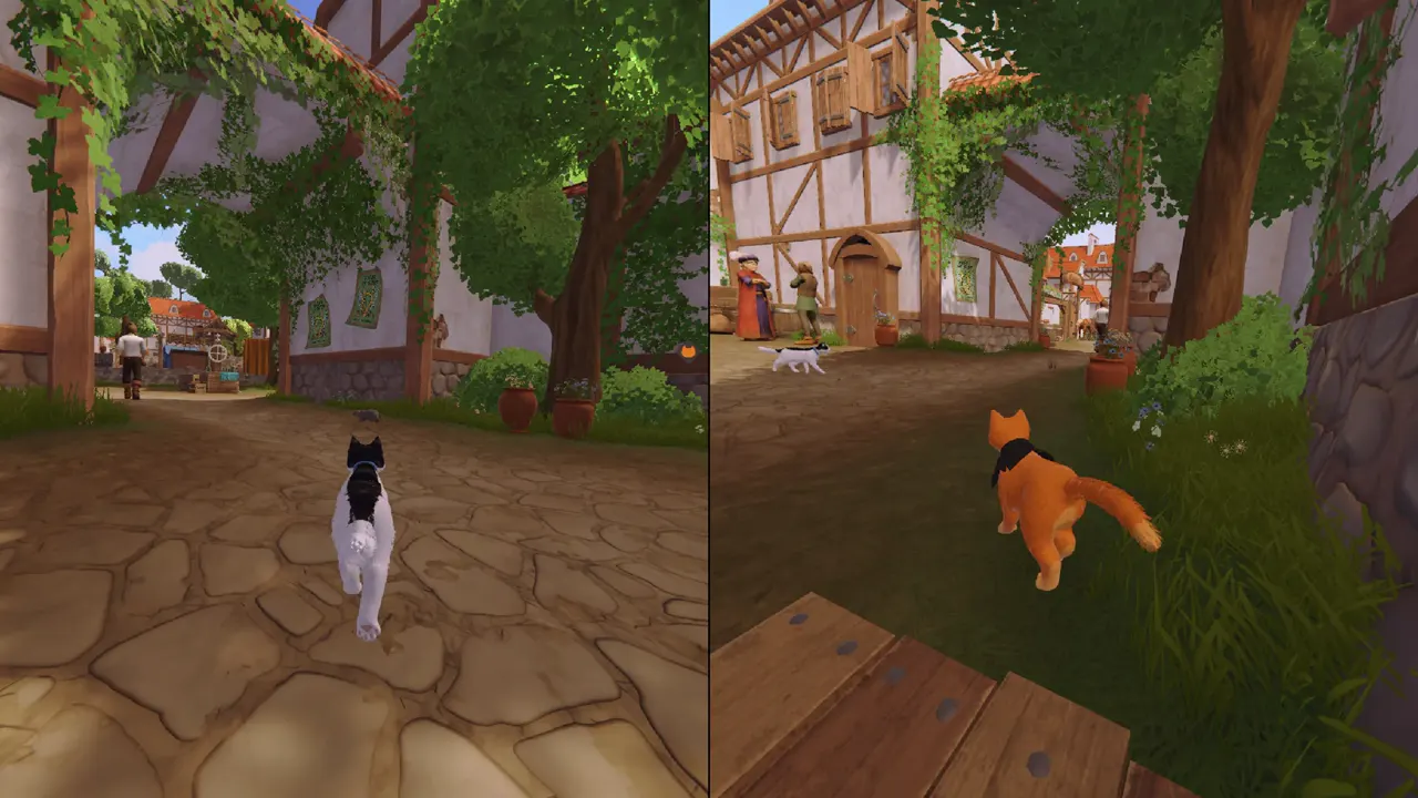 Split-screen view of both cats exploring a leafy medieval village lane